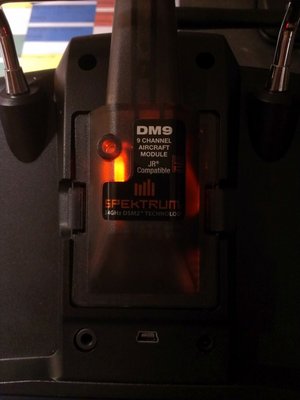 finished DSM hack module inside Taranis module bay, lit by R615X's led