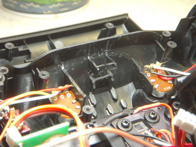 Note the slot cut into the upper plastic piece.  This slot is for the speaker which comes with the Megasound board.