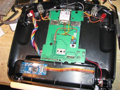 USBASP glued to bottom of battery compartment (inside radio)